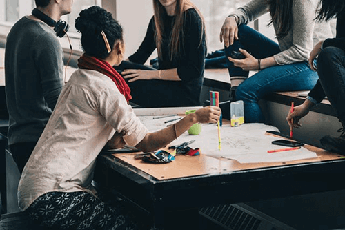 Employees having a meeting in the office.