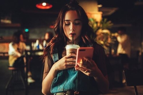 An employee having a coffee on their break