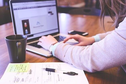 an employee working at their desk