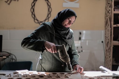 A worker performing a trade