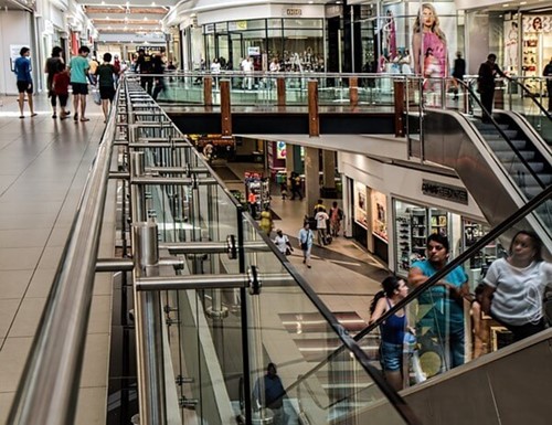 A mezzanine staircase in a shopping center